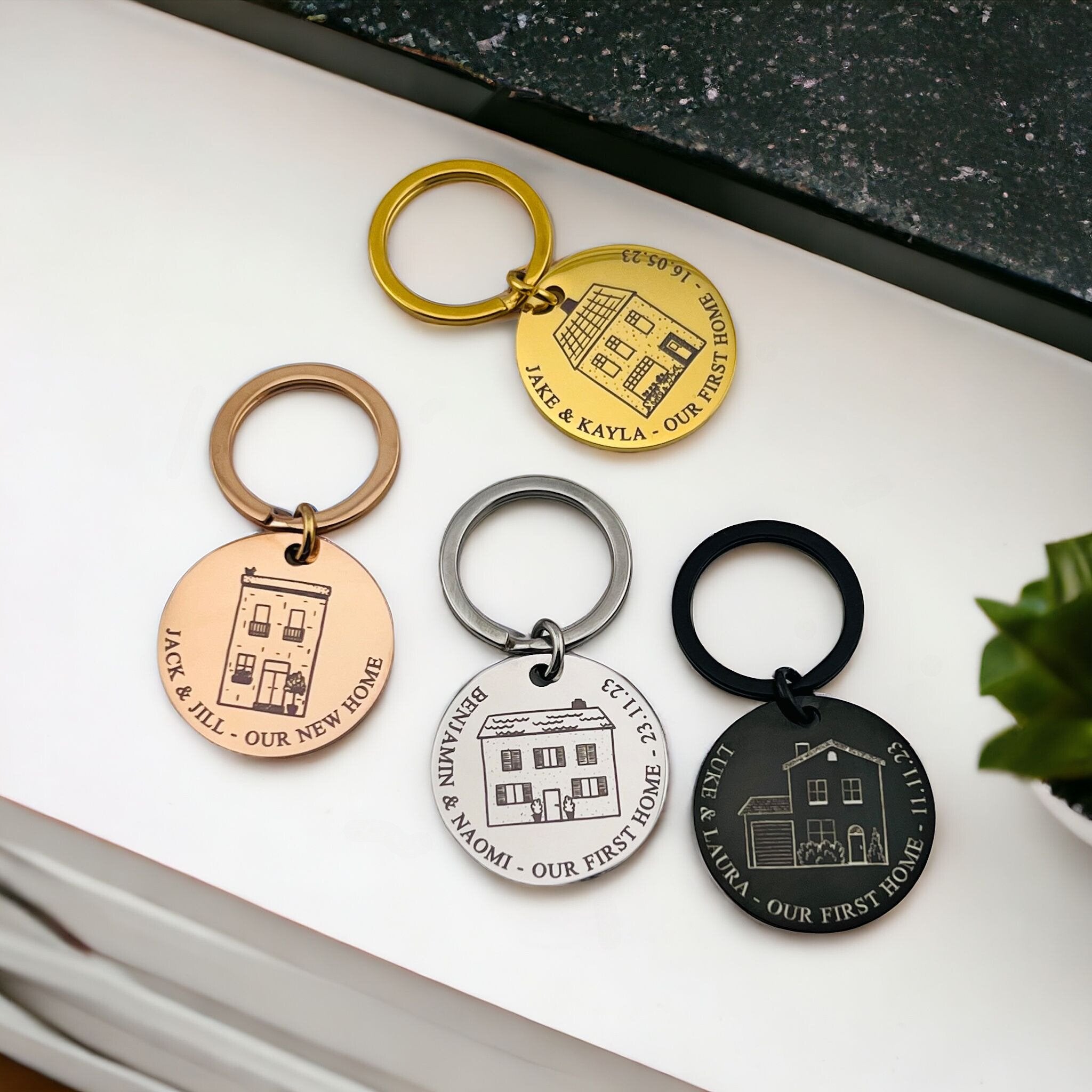 Pair of First Home Disc Keychains